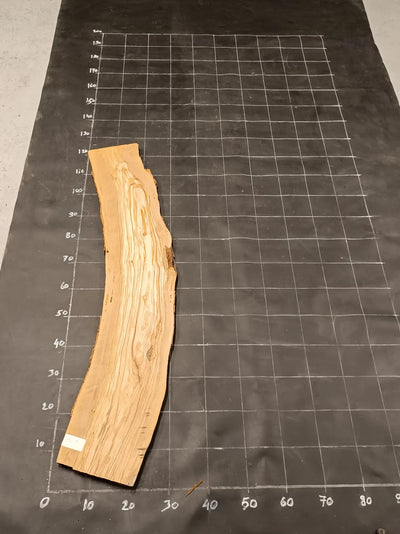 Planche en bois d'olivier rabotée 175×28 cm à bord naturel — pièce unique (P19)