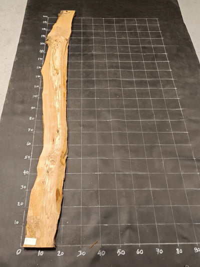 Planche en bois d'olivier rabotée 185×28 cm à bord naturel — pièce unique (P24)