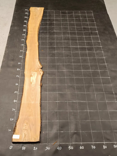 Planche en bois d'olivier rabotée 185×30 cm à bord naturel — pièce unique (P28)